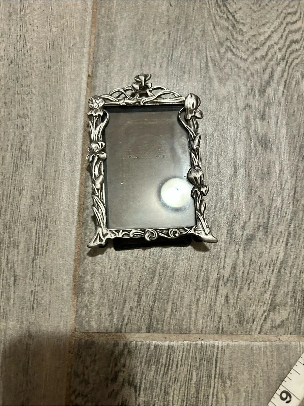 miniature vintage picture frame styled in an intricate Art Nouveau design
